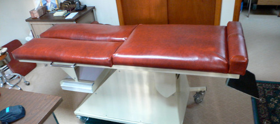 Image of a chiropractic adjustment table